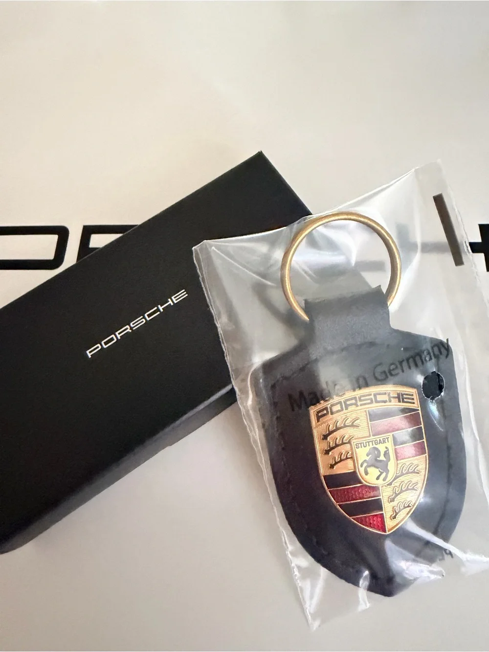 Authentic Porsche Design Black Leather Keyring with Gold